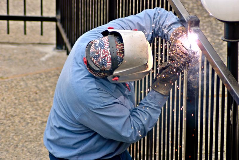 Local Metal Fence Service pros at work
